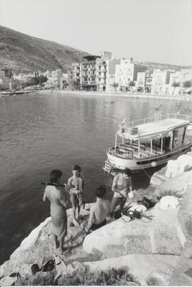 Bathers at Xlendi Bay, Gozo
