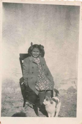 Jean Despott sat in a chair and her pet cat