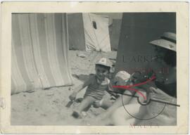 Woman and a boy at the beach