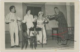 Four actors acting on set