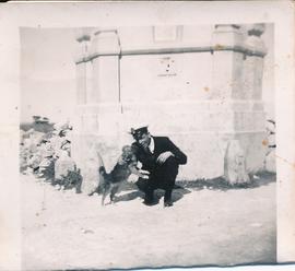 A sailor with a dog