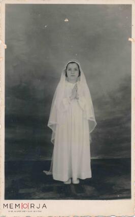 Carmen Pizzuto dressed for her first Holy Communion