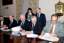 Frank Mifsud, signing an agreement