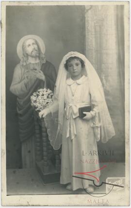 Photo of a young girl on the occasion of her first holy communion