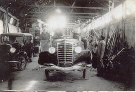 A Mack Junior chassis part-way through being bodied