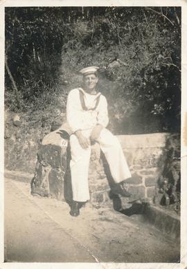 A sailor posing for a photograph