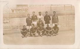 A group of footballers posing for a photograph