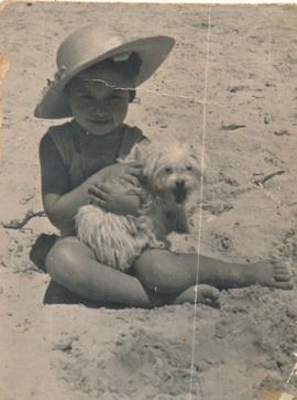 Jean Despott and her pet dog at the beach