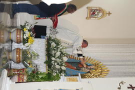 Don Carmelo during the celebration of "Consegna delle Chiavi" to the statue of Our Lady of Lampedusa