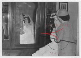 A woman on her Wedding Day together with her mother