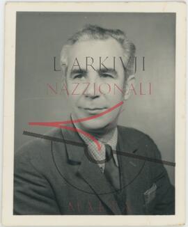 A portrait of Karmenu