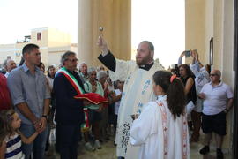 Don Carmelo La Magra during the blessing of the keys