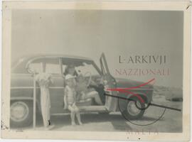 Family in a Borgward car