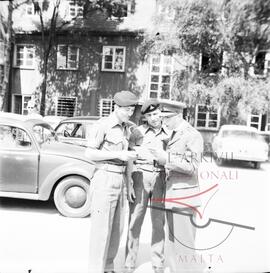 A Maltese Chaplin and  soldiers in Germany