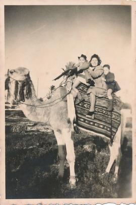 Jean and Maurice with Anne Despott on a camel