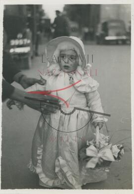 Young girl in costume during Carnival