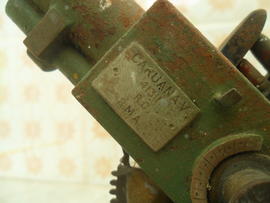 Vincent 'Ċensinu' Caruana's personal details on the side of an iron model Bofors 40 mm anti-aircraft gun