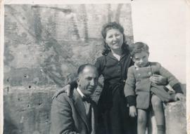 George, Anne and Carlo Despott on the roof of their house