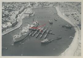 Submarines at Msida creek with parent ship