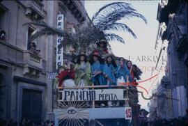 Carnival with people on float wearing ponchos as costumes