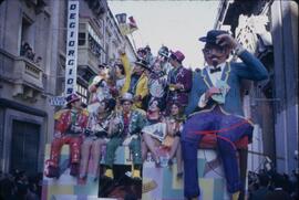 Carnival with people on float wearing costumes