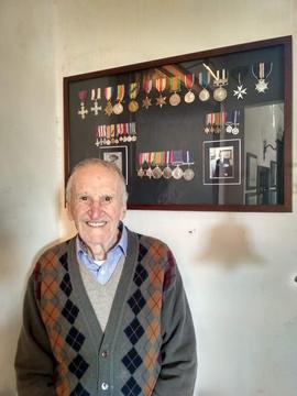 Henry Louis Gatt with his and his father's medals