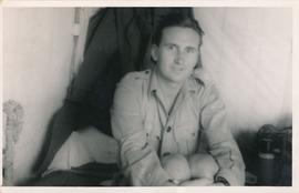 Henry Louis Gatt in a tent during his posting in Palestine