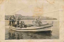 Salvatore Davì and other fishermen on a Stella di Mare boat