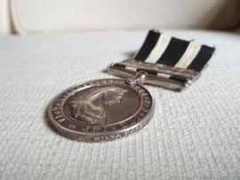 Bottom edge of Service Medal of the Order of St John, awarded to Anthony Joseph Gatt