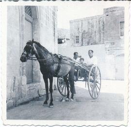 Salvu Schembri and others on a horse-drawn carriage