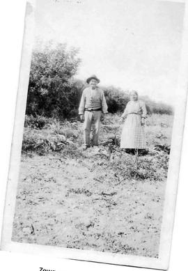 Two elderly in the fields