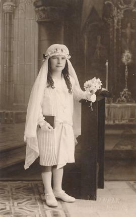 Postcard showing Mary Callus in Holy Communion attire