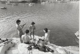 Bathers at Xlendi Bay, Gozo